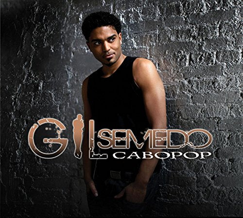 Man in black tank top stands against dark, textured wall, album title "CABOPOP" below.