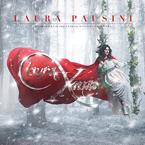 Album cover for Laura Pausini’s “Laura Xmas” featuring her in a winter forest.