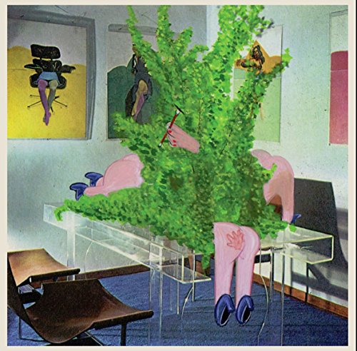 A surreal image of a woman's legs under a bushy green plant on a table.