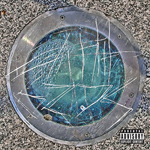 Album cover: cracked blue circle with white scratches, parental advisory label.