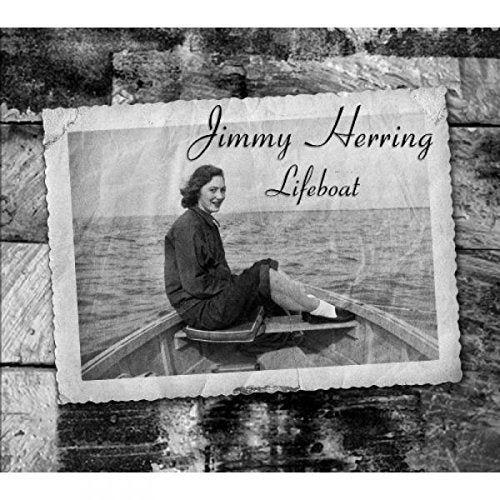 "CD cover with black and white photo of woman in a boat."