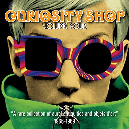 CD cover: face with large, colorful striped sunglasses, text "Curiosity Shop.