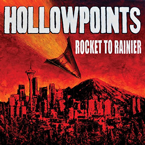 Album cover: rocket over a city with a mountain backdrop.