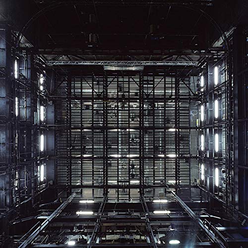 Black and white image of a complex, geometric metal structure.