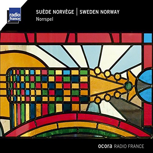CD cover: abstract stained-glass design in red, yellow, blue, and green.