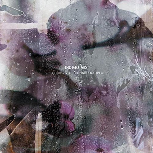 Indigo Mist album cover: abstract purple and gray watercolor textures.