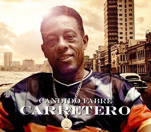 Candido Fabre album cover, portrait of a smiling Black man with a city backdrop.