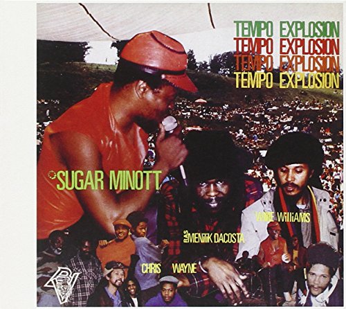 "Album cover featuring a man singing into a microphone with a crowd in the background."