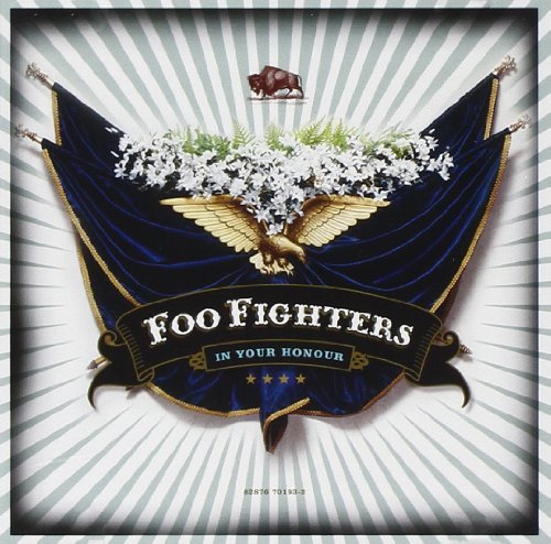Foo Fighters "In Your Honour" CD cover with eagle and floral wreath.
