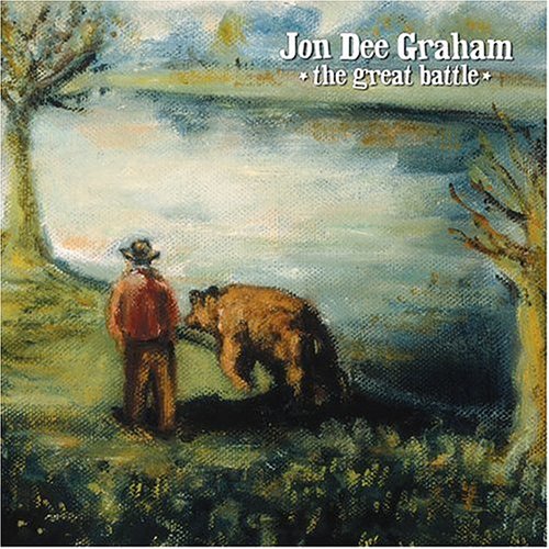 "Album cover art: man and bear by a river, with artist name and title."
