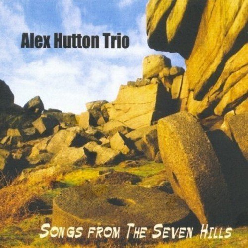 "CD cover featuring rocky landscape with 'Alex Hutton Trio' and 'Songs from the Seven Hills' text."
