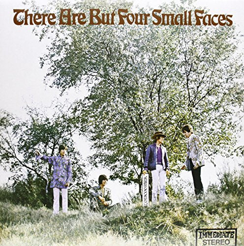 "Album cover with four men standing in a grassy field, under a tree."