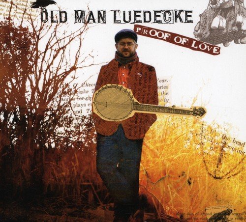 Man holding banjo stands outdoors, album cover art for "Old Man Luedecke - Proof Of Love".