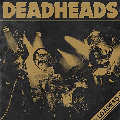 CD cover for “Loaded” featuring a band performing on stage.