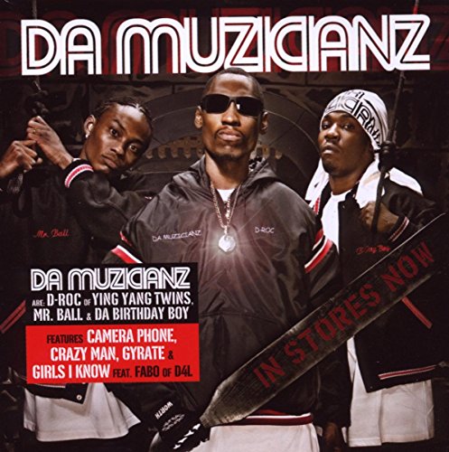 "Album cover with three men in black jackets and white pants."