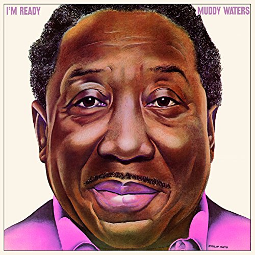 Close-up portrait of Muddy Waters on album cover, pink background.