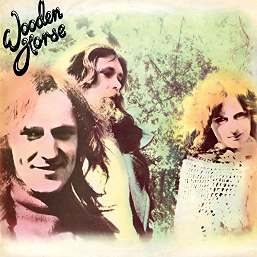 Album cover for “Wooden Horse” featuring three people with long hair.