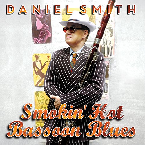 Album cover: Daniel Smith with bassoon, wearing a striped suit and hat.