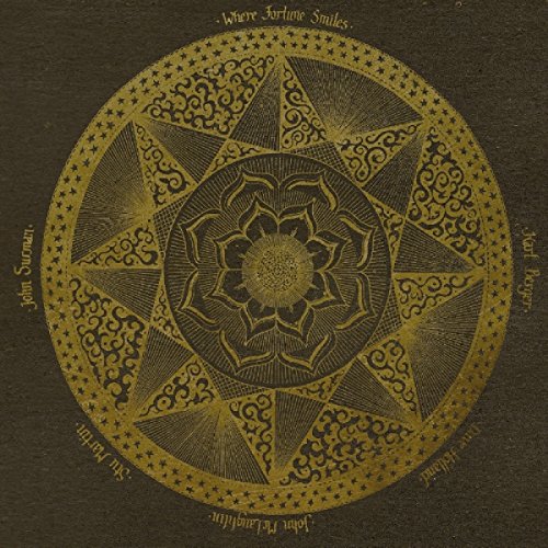 A gold mandala on a dark brown background with artist and album title.