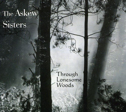 CD cover for The Askew Sisters’ “Through Lonesome Woods,” featuring trees.
