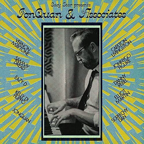 LP cover featuring a portrait of a man at a piano, with yellow rays.