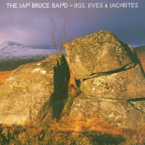 "Album cover with large rocks, snowy mountain, and dark sky, titled 'Jigs, Jives & Jacobites'."