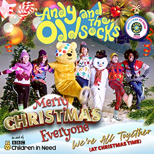 Band members and characters in winter clothing for Children in Need.