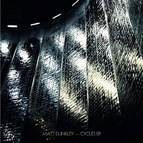 Dark, abstract album cover for Matt Dunkley’s “Cycles” with text at bottom.
