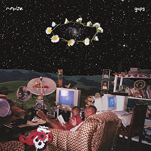 Album cover: “gaps” by Miloe, featuring daisies and a living room scene.
