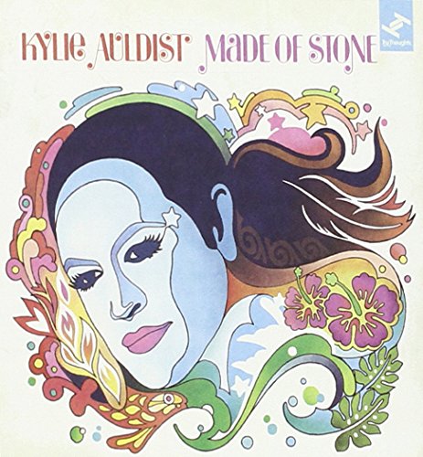 "Kylie Auldist's 'Made of Stone' album cover featuring a stylized, colorful illustration of a woman."