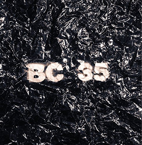 "Black crinkled background with 'BC 35' in silver, reflective foil letters."