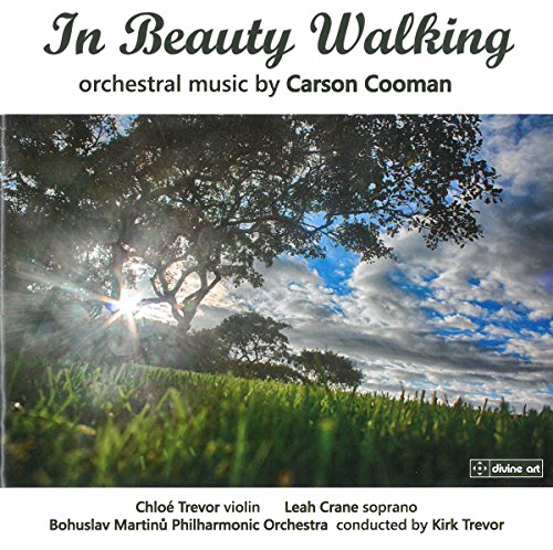CD cover: tree in a field under a bright, cloudy sky.