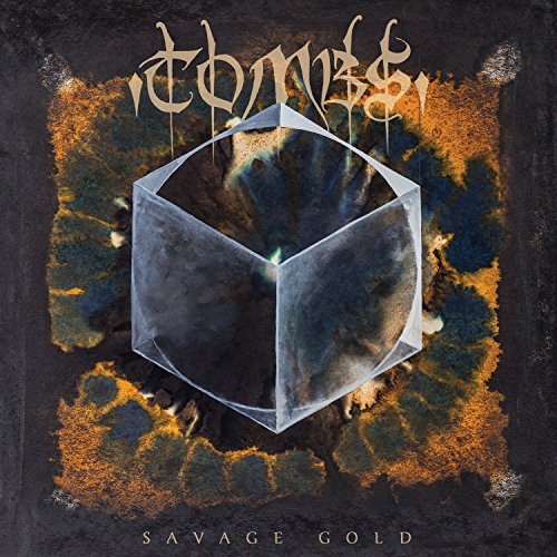 The image is an album cover featuring a transparent cube against a dark, textured background. For accessibility purposes, a suitable alt text could be: "Album cover with 'Tombs' and 'Savage Gold' text, featuring a transparent cube."