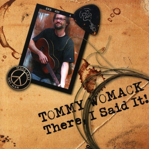 "CD cover featuring a man holding a guitar on a brown background."