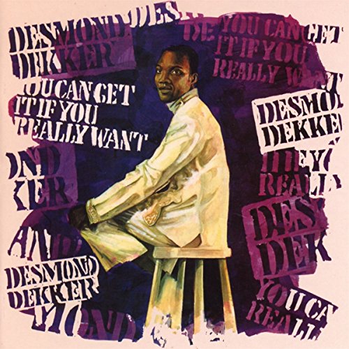 Desmond Dekker album cover featuring a man in a white suit on a stool.