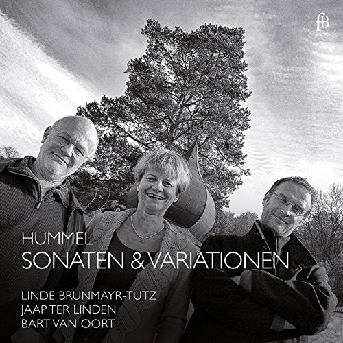 Black-and-white image of a CD cover featuring three musicians outdoors.