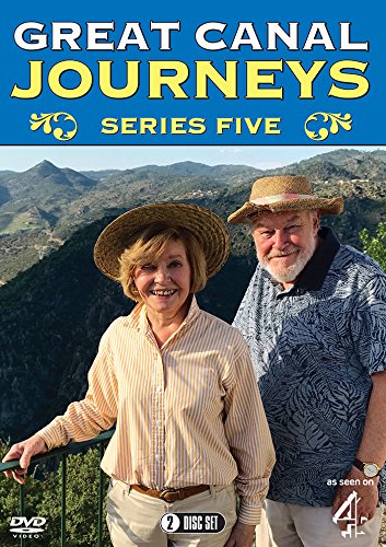"DVD cover featuring a smiling couple in hats with a mountainous landscape."