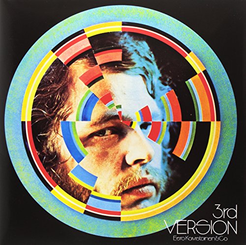 Vinyl album cover with a man's face in a multicolored circular design.