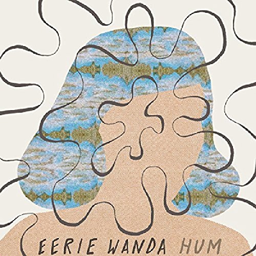 A jigsaw puzzle head with blue hair and the text "EERIE WANDA HUM".