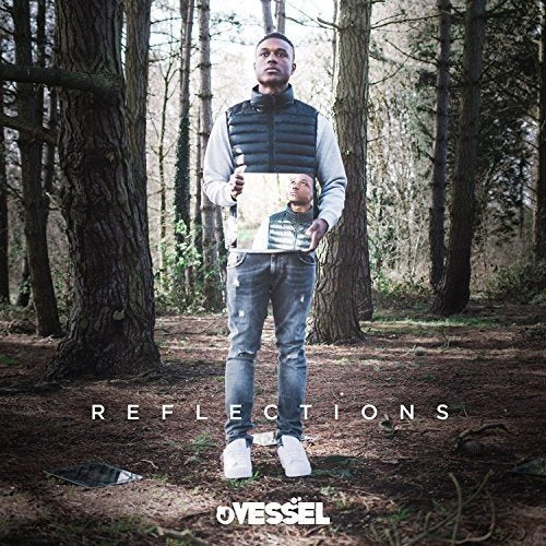 Man stands in a forest, holding a photo of himself, with "REFLECTIONS" and "JVESSEL" text.