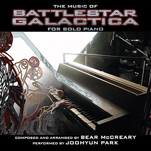 A pianist plays a grand piano next to abstract, tribal-style graphic art.