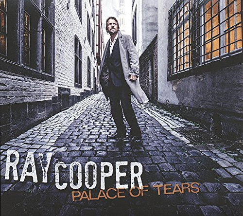 "Album cover: man in suit on cobblestone street, 'Ray Cooper Palace of Tears' text."