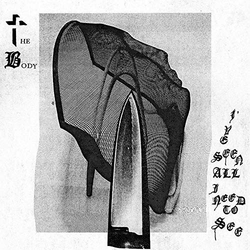 Black and white album cover featuring a high-heeled shoe with a mesh veil.