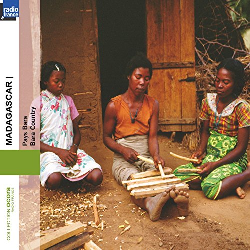 CD cover: three Malagasy women with musical instruments outdoors.