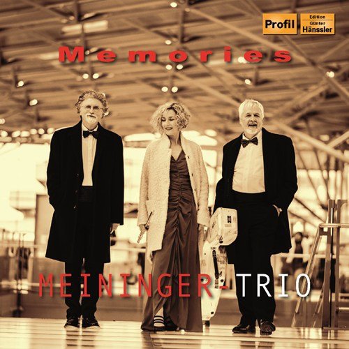 "CD cover featuring three musicians in formal attire, sepia-toned background."