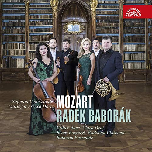 A CD cover featuring five musicians in formal attire holding various instruments in a library.