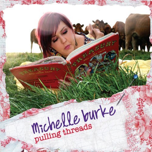 "Album cover: woman reading in a field with cows, surrounded by floral border."
