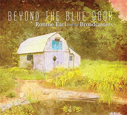 Vinyl album cover featuring a weathered barn near a pond surrounded by greenery.