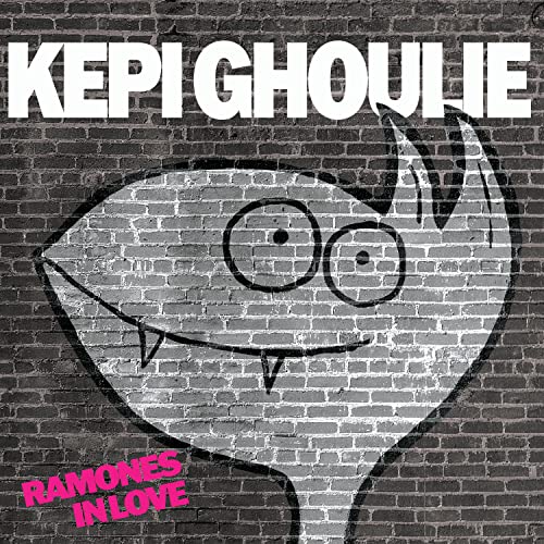 Album cover: cartoon face with glasses on a brick wall.