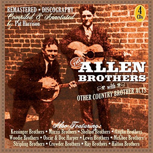 "CD cover featuring sepia-toned photo of two men playing instruments against a brick wall."